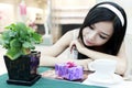 Asian girl with her gift Royalty Free Stock Photo