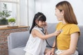 Girl Hold Stethoscope Imagines Herself to be a Doctor Listen to Her Mom Heart Pulse