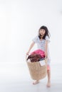 Asian girl holding a laundry basket isolated Royalty Free Stock Photo