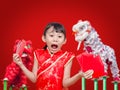 Asian girl holding red packet money