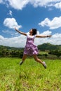 Asian girl jumps Royalty Free Stock Photo