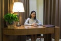 Asian girl like working woman, getting an interview on her desk