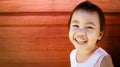 Asian girl little toddler child laughing and looking at camera Royalty Free Stock Photo