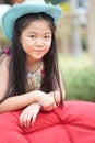 Asian girl with long hair wearing blue cowboy hat Royalty Free Stock Photo