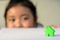 Asian girl playing house model, select focus