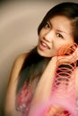 Asian girl playing slinky