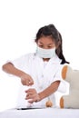 Asian girl pretending to be a doctor wearing healthy mask