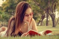 Asian Girl Reading Book at Parks Royalty Free Stock Photo