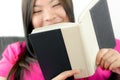 Asian girl reading book Royalty Free Stock Photo
