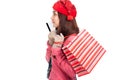 Asian girl with red christmas hat ,credit card and shopping bag Royalty Free Stock Photo