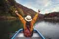 Asian girl relax by paddle and a rent boat on river in arashiyama park Royalty Free Stock Photo