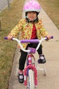 Asian Girl riding Bike Royalty Free Stock Photo