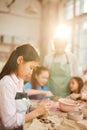 Asian Girl Shaping Clay Royalty Free Stock Photo