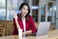 Asian girl shoping online by credit card Royalty Free Stock Photo