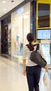 Asian girl in shopping mall background Royalty Free Stock Photo