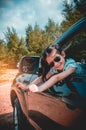 Asian girl smiling with perfect smile while sitting in the car. Royalty Free Stock Photo