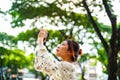 Asian girl student learn photography with small pocket camera outdoor at day Royalty Free Stock Photo