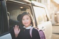 Asian girl in student uniform going to school by car Royalty Free Stock Photo