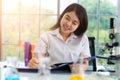 Asian girl students are doing science experiments in a science lab Royalty Free Stock Photo