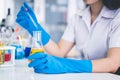 Asian girl students are doing science experiments in a science lab Royalty Free Stock Photo