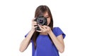 Asian girl takes a picture with digital camera Royalty Free Stock Photo