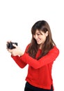 Asian girl taking photo with a compact camera Royalty Free Stock Photo