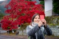 An asian girl tavel in Nikko in Autumn