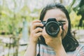 Asian Girl Teen using DSLR Camera Photography Royalty Free Stock Photo