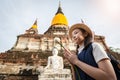 Asian girl tourist holding a lotus with respecting or pray at Wa Royalty Free Stock Photo