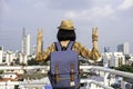 Asian girl tourists Traveling backpackers stand to admire the beauty of the building. and landscape of Bangkok, Thailand. during