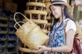 Asian girl, travel and shopping in traditional basketry shop Royalty Free Stock Photo