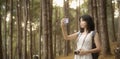 Asian girl travel and walk on the bridge at Pang umg park