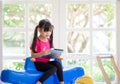 Asian girl using tablet , early education and learning