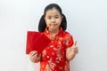 Asian girl wear cheongsam and take Red envelopes in chinese new year Royalty Free Stock Photo