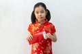 Asian girl wear cheongsam and take Red envelopes in chinese new year Royalty Free Stock Photo