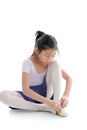 Asian girl wearing ballet shoes on white background. Royalty Free Stock Photo