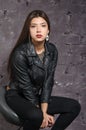 Asian girl wearing a black jacket Royalty Free Stock Photo