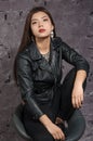 Asian girl wearing a black jacket Royalty Free Stock Photo