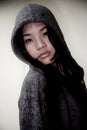 Asian girl wearing a hood jacket Royalty Free Stock Photo