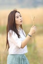 Asian girl at wheat field