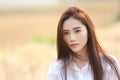 Asian girl at wheat field