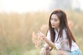 Asian girl at wheat field