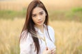 Asian girl at wheat field