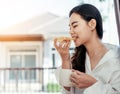 Asian girl who just wake up in the morning as relaxed. Royalty Free Stock Photo