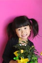 Asian Girl with Yellow Rose Plant