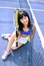 Asian girls playing tennis Royalty Free Stock Photo