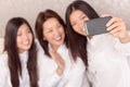 Asian girls and there mommy doing selfie