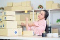 Asian girls are tired of working,work home,small business online Royalty Free Stock Photo