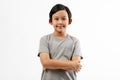 Asian good looking boy child is smiling, Happy little boy while posing at the camera on white background Royalty Free Stock Photo