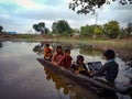 asian government school kids learning about laptop computer system on sailing boat in india January 2020 Royalty Free Stock Photo